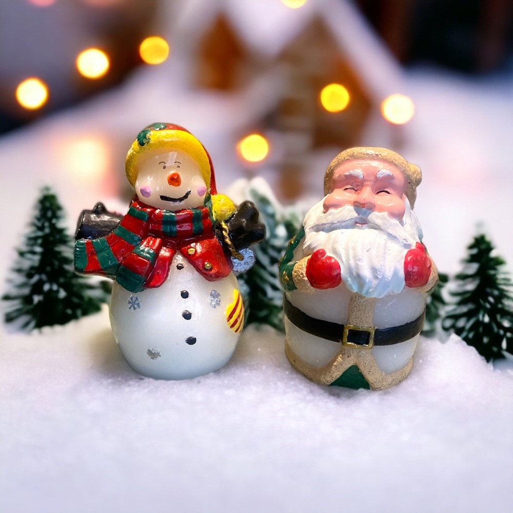 Lighted wax snowman and Santa clause Christmas candles